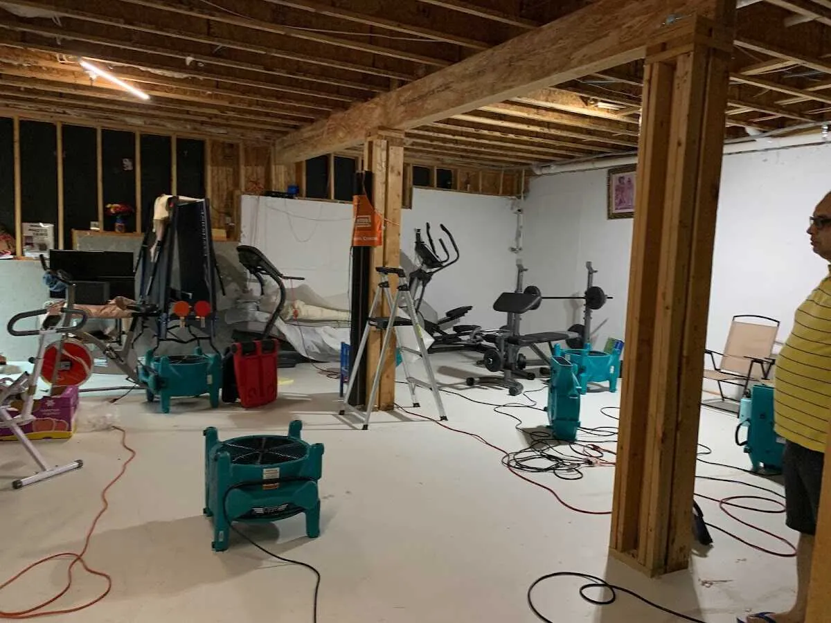 Basement drying equipment setup for Contents Cleaning & Restoration in Lawrenceburg
